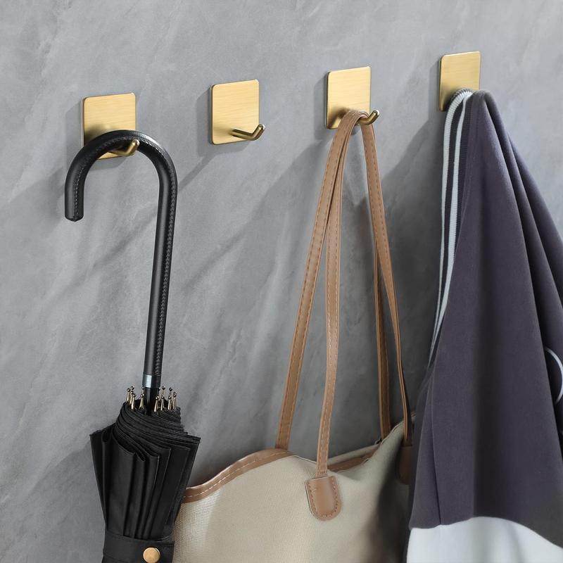 Adhesive Towel Hooks Bathroom Hook, Gold Self Adhesive Hooks Heavy Duty Coat Hooks 4-Packs, Non-Punching for Hanging Robes Clothes Hats Stick on Kitchen Bedroom Wall Door, Stainless Steel Organiser Smooth Waterproof Cushion Hangable Hangers